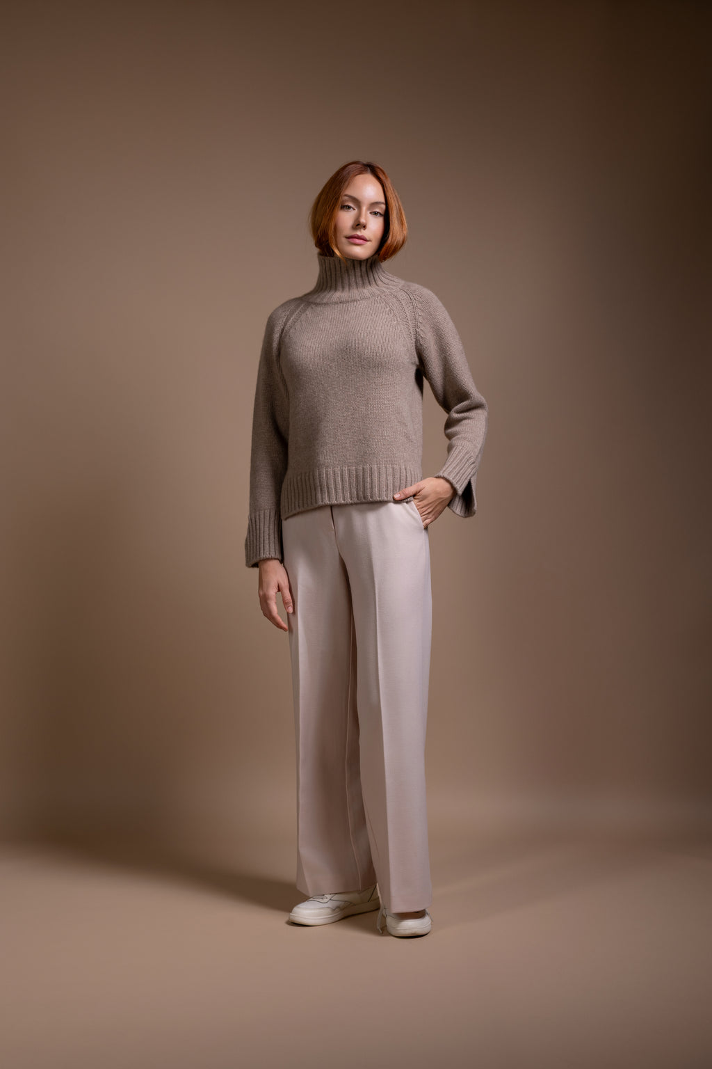"Siena" rollneck with slits at hem and sleeves