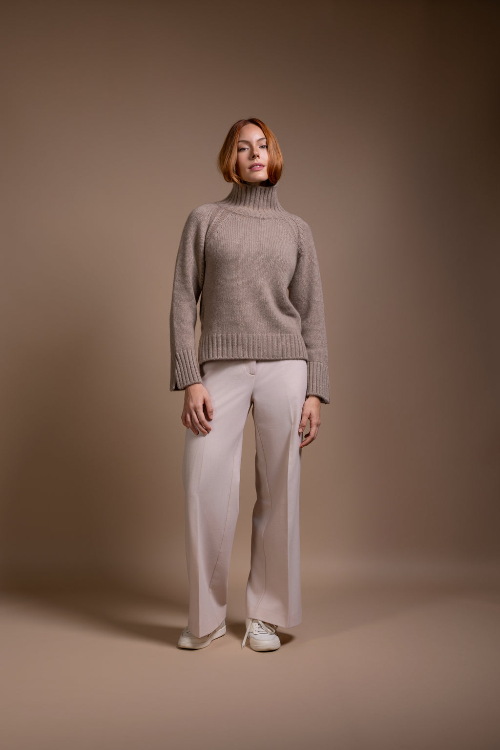 "Siena" rollneck with slits at hem and sleeves