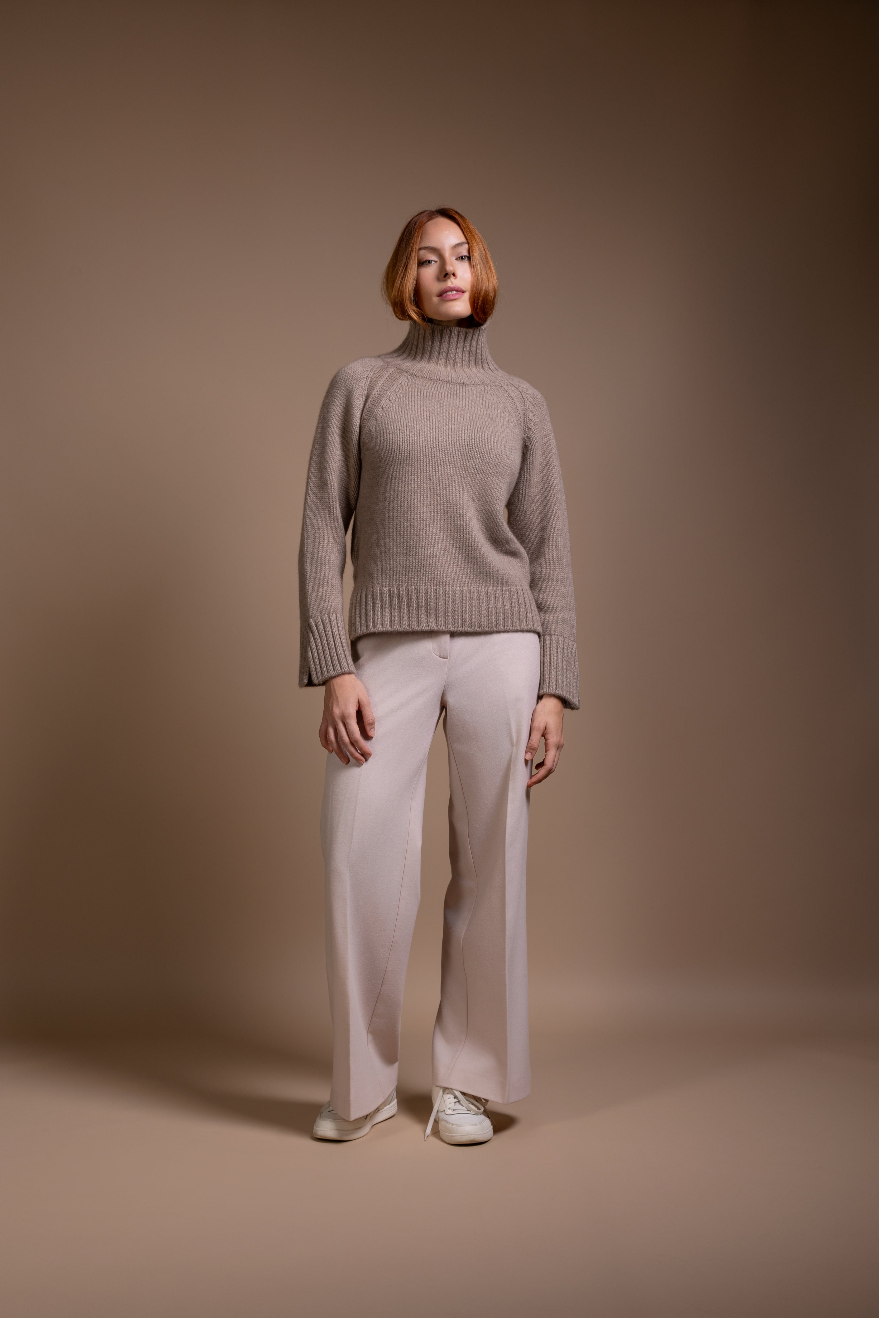 "Siena" rollneck with slits at hem and sleeves