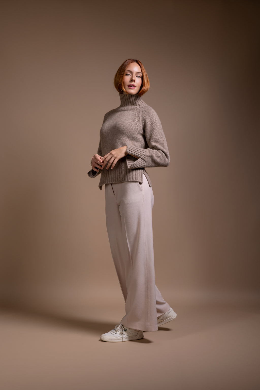 "Siena" rollneck with slits at hem and sleeves