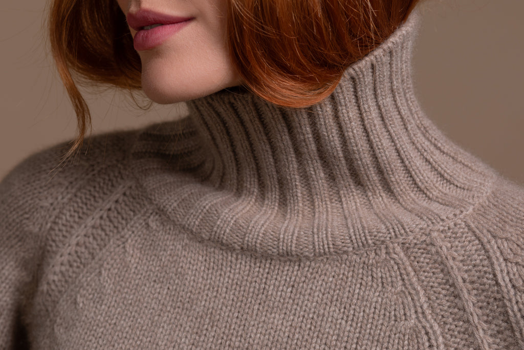 "Siena" rollneck with slits at hem and sleeves