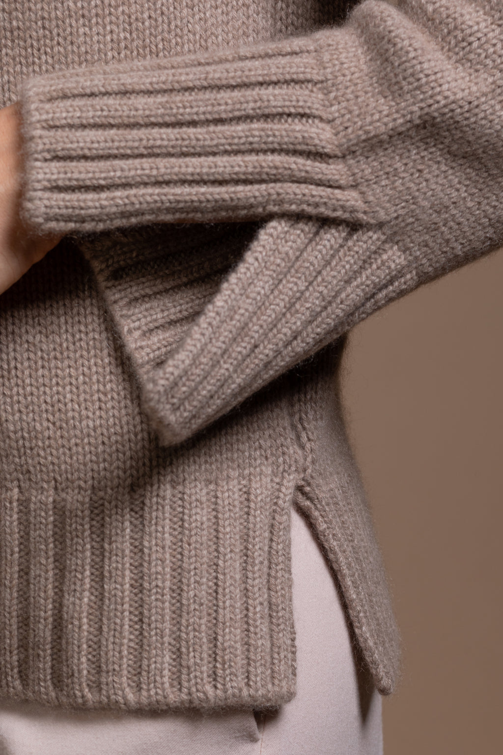 "Siena" rollneck with slits at hem and sleeves