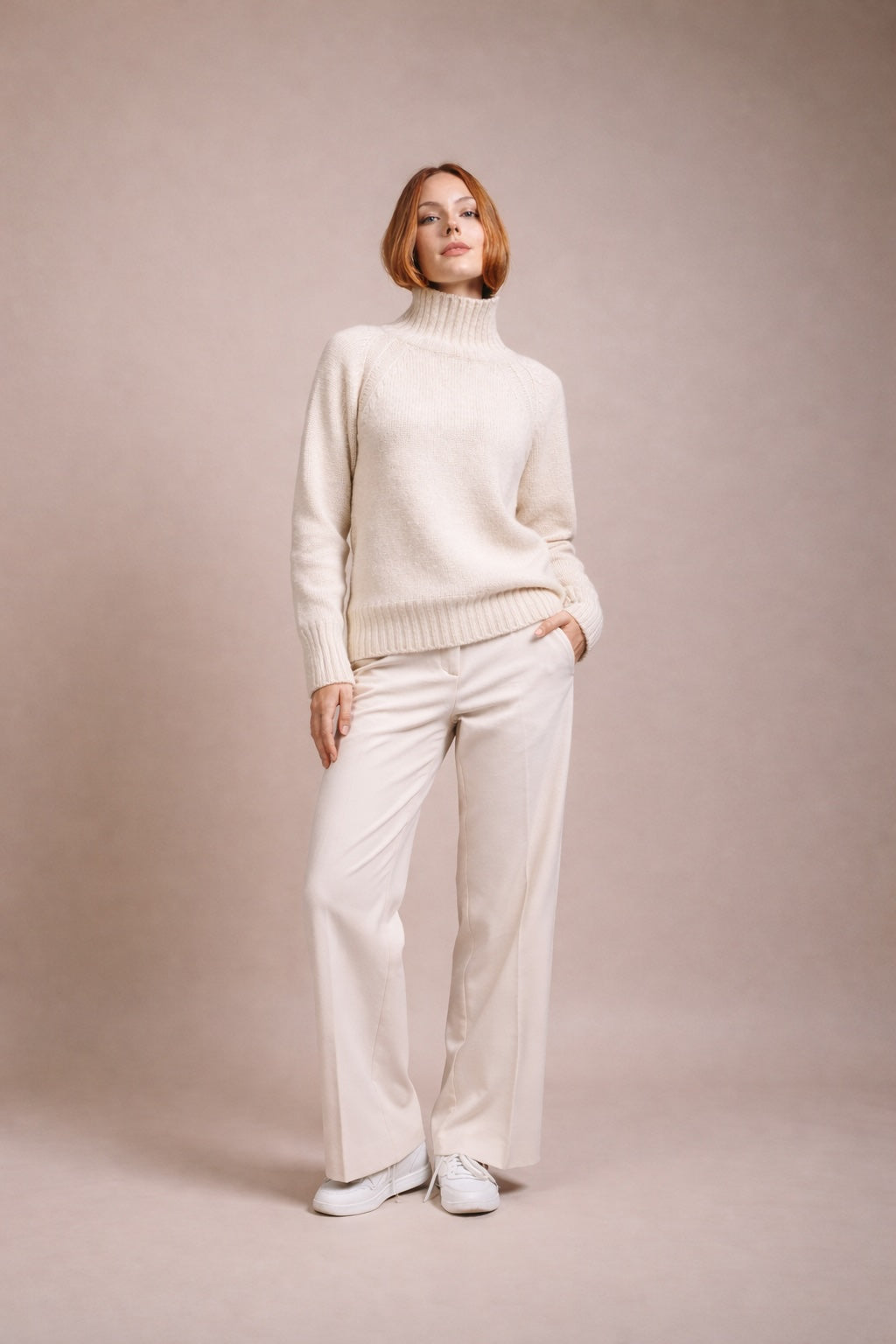 "Siena" rollneck with slits at hem and sleeves