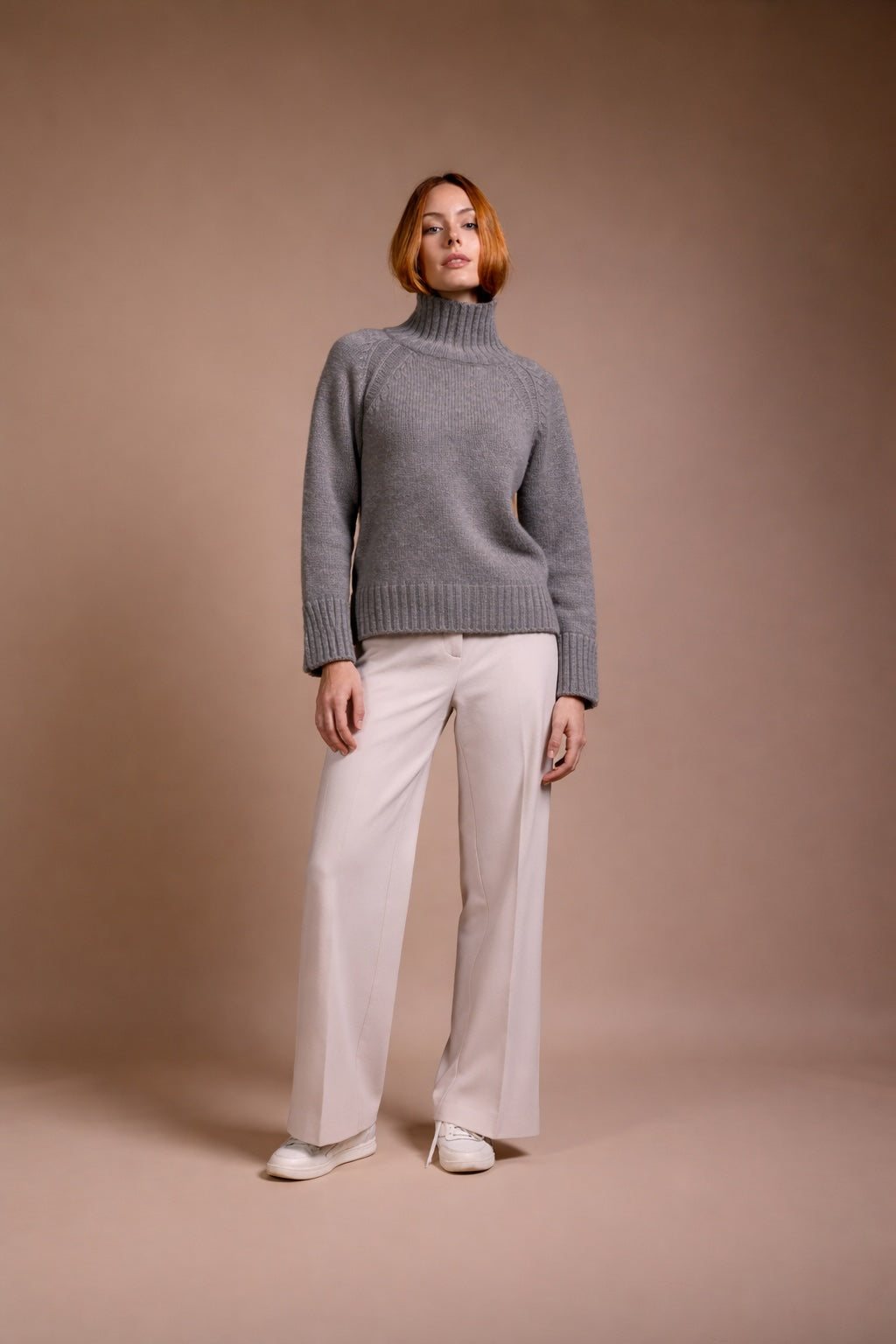 "Siena" rollneck with slits at hem and sleeves